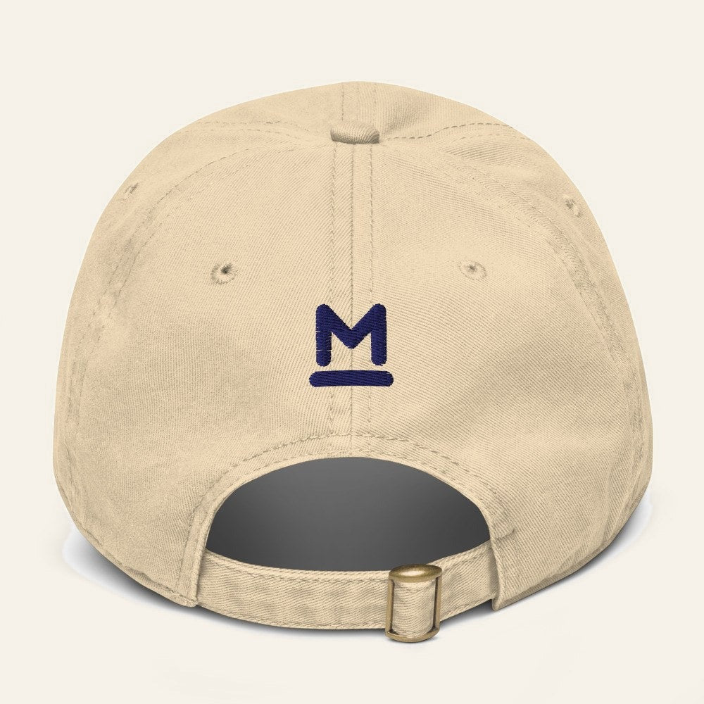 The Del Mar Cap in Khaki, back. Bar M in navy thread.