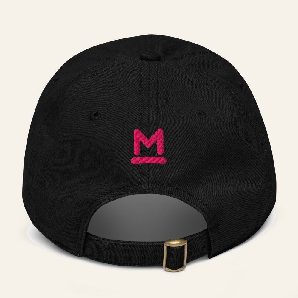 The De la Ciudad Cap in Black, back. Bar M in flamingo pink thread.